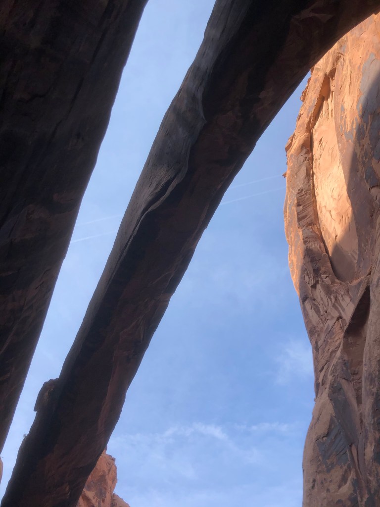 Not too much separation from the rock alongside it but still an arch